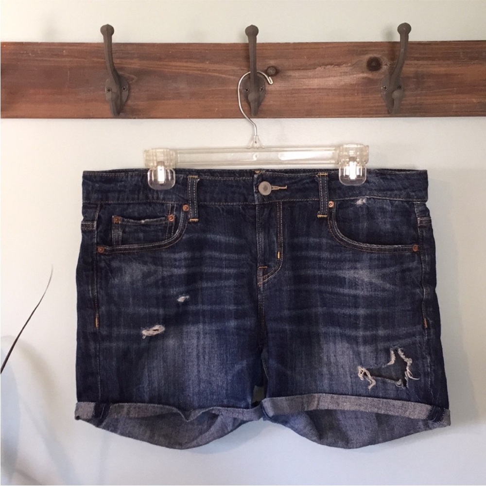 American Eagle distressed dark wash jean shorts.